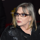 Actress Carrie Fisher attends the premiere of Walt Disney Pictures and Lucasfilm’s Star Wars: The Force Awakens at the Dolby Theatre on Dec. 14, 2015, in Hollywood, Calif.
Ethan Miller/Getty Images